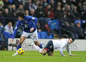 Fellaini vs. Davies: A Premier League Showdown at Reebok Stadium (13 February 2011)