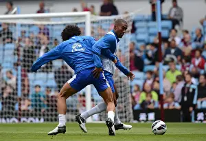 Aston Villa 1 V Everton 3: Villa Park: 25-08-2012 Prints: Fellaini vs. Distin: Intense Rivalry Unfolds in Everton's Warm-Up at Villa Park