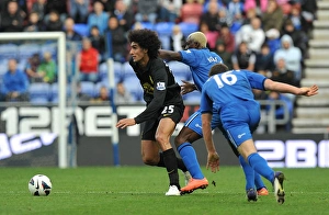 Wigan Athletic 2 V Everton 2 : DW Stadium : 06-10-2012 Prints: Fellaini vs. Kone: Intense Rivalry at DW Stadium - Everton vs