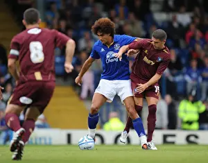 15 July 2011 Bury V Everton Prints: Fellaini vs. Lowe: A Football Battle at Gigg Lane (July 15, 2011)