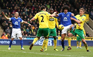 Norwich City 2 V Everton 1 : Carrow Road : 23-02-2013 Prints: Fellaini vs. Martin: A Fight for Supremacy in the Midfield - Norwich City vs