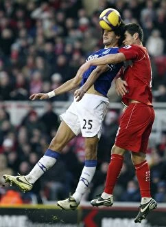 Images Dated 26th December 2008: Fellaini vs Riggott: Heading Battle at Riverside Stadium - Everton vs Middlesbrough