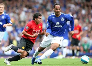 Framed Print : Football - Everton v Manchester United Barclays Premier League - Goodison Park - 15 / 9 / 07 Evertons Joleon Lescott (R) and Manchester Uniteds Carlos Tevez in action Mandatory Credit: Action Images / Matthew Framed Print : Football - Everton v Manchester United Barclays Premier League - Goodison Park - 15 / 9 / 07 Evertons Joleon Lescott (R) and Manchester Uniteds Carlos Tevez in action Mandatory Credit: Action Images / Matthew