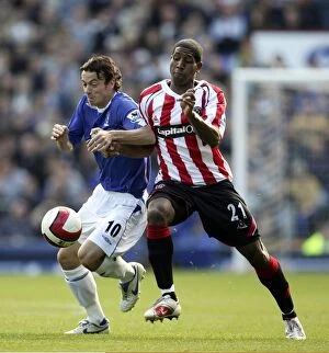 Football - Everton v Sheffield United FA Barclays Premiership - Goodison Park - 21 / 10 / 06 Simon Davies - Everton and Mikele Leigertwood - Sheffield United in action Mandatory Credit: Action Images / Carl Recine Livepic