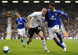 Football - Fulham v Everton Barclays Premier League - Craven Cottage - 16 / 3 / 08 Evertons Joleon Lescott and Fulhams Leon Andreasen Mandatory Credit: Action Images / John Sibley Livepic NO ONLINE / INTERNET USE WITHOUT A LICENCE FROM THE FOOTBA