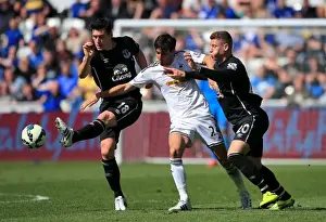Swansea City V Everton - Liberty Stadium Prints: Gareth Barry vs Jack Cork: A Battle of Midfield Masters in Everton vs Swansea City