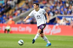 Images Dated 16th August 2014: Gareth Barry vs Leicester City: Everton's Battle at King Power Stadium - Barclays Premier League