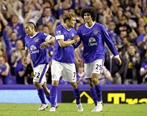 Everton 1 v Manchester United 0 : Goodison Park: 20-08-2012 Collection: Glory Days: Fellaini and Jelavic Celebrate Everton's Historic First Goal Against Manchester United