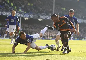 FA Cup Prints: Heitinga vs Drogba: A FA Cup Battle at Goodison Park (Everton vs Chelsea, January 2011)