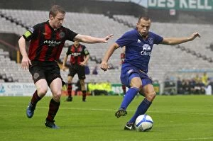 15 August 2011 Bohemians v Everton Collection: Heitinga vs. Flood: A Football Battle for the Ball - Everton's John Heitinga vs