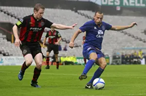 15 August 2011 Bohemians V Everton Prints: Heitinga vs. Flood: A Football Battle for the Ball - Everton's John Heitinga vs