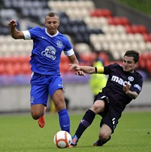 Pre Season Friendly - Partick Thistle v Everton Reserves - Firhill Stadium Collection: Hope vs Paton: A Fierce Rivalry Unfolds in Everton's Pre-Season Clash against Partick Thistle