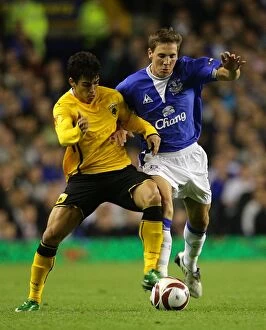 Images Dated 17th September 2009: Intense Battle for the Ball: Everton vs AEK Athens - UEFA Europa League, Goodison Park