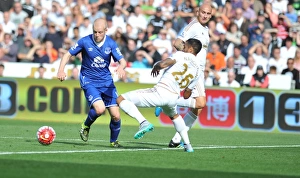 Framed Print : Intense Battle for Ball Possession: Naismith vs. Naughton - Swansea City vs. Everton, Premier League