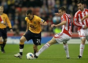 Images Dated 1st May 2012: Intense Battle for Ball Possession: Osman vs Upson at Britannia Stadium (Everton vs Stoke City)