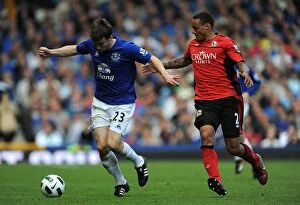 Images Dated 16th April 2011: Intense Battle for Ball Possession: Seamus Coleman vs. Jermaine Jones - Everton vs