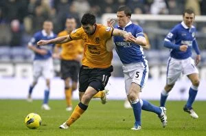 Images Dated 4th February 2012: Intense Battle for Ball Possession: Stracqualursi vs Caldwell