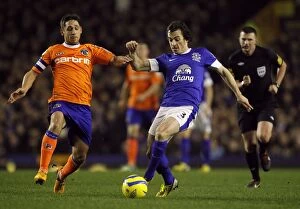FA Cup : Round 5 Replay : Everton 3 v Oldham Athletic 1 : Goodison Park : 26-02-2013 Collection: Intense Battle: Leighton Baines vs Dean Furman - Everton's FA Cup Victory over Oldham Athletic (3-1)