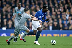 Everton V Newcastle United - Goodison Park Prints: Intense Battle: Lukaku vs. Taylor at Goodison Park - Everton vs