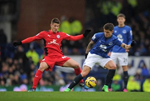 Everton V Leicester City - Goodison Park Prints: Intense Battle for Possession: Muhamed Besic vs