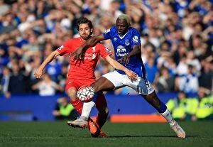Images Dated 4th October 2015: Intense Rivalry: Arouna Kone vs Joe Allen - Battle for Ball Possession at Goodison Park
