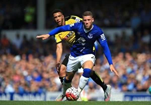 Everton v Watford - Goodison Park Collection: Intense Rivalry: Barkley vs. Capoue's Battle for Ball Possession - Everton vs