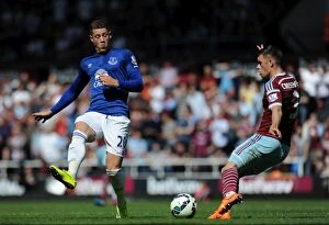 Images Dated 16th May 2015: Intense Rivalry: Barkley vs Cresswell at Upton Park - Everton vs West Ham United, Premier League