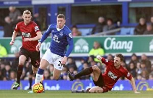 Images Dated 13th February 2016: Intense Rivalry: Barkley vs. Evans - A Battle for Ball Possession at Goodison Park