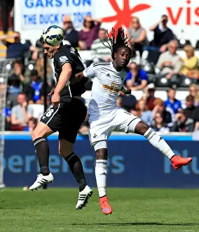 Swansea City V Everton - Liberty Stadium Prints: Intense Rivalry: Barry vs Emnes in Swansea City vs Everton (Barclays Premier League)