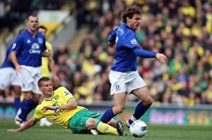 Images Dated 7th April 2012: Intense Rivalry: Bennett vs. Jelavic Clash at Carrow Road