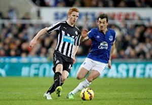 Images Dated 28th December 2014: Intense Rivalry: Colback vs. Baines at St. James Park - Everton vs. Newcastle United, Premier League