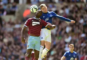 West Ham United V Everton - Upton Park Prints: Intense Rivalry: Cole vs. Stones - West Ham United vs. Everton: A Battle for Supremacy