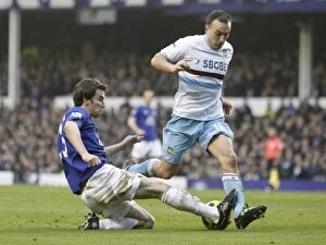Images Dated 24th January 2011: Intense Rivalry: Coleman vs Noble - Everton vs West Ham United