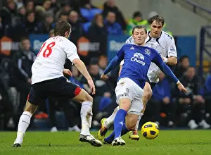 13 February 2011 Bolton Wanderers V Everton Prints: Intense Rivalry: Coleman vs. Ricketts Battle for Ball - Everton vs