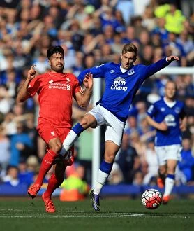 Images Dated 4th October 2015: Intense Rivalry: Deulofeu vs. Can Battle at Goodison Park - Everton vs. Liverpool, Premier League