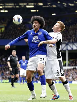 28 April 2012 V Fulham, Goodison Park Prints: Intense Rivalry: Fellaini vs Riise - Battle for the Ball at Goodison Park (Everton vs Fulham)