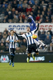 Intense Rivalry: Funes Mori vs. Mitrovic - Battle for the Ball in Newcastle v Everton Premier League Clash