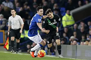 Everton V Stoke City - Goodison Park Prints: Intense Rivalry: Gareth Barry vs Bojan Krkic - Everton vs Stoke City's Battle for Supremacy at Goodison Park