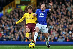 John Heitinga Prints: Intense Rivalry: Heitinga vs. Arshavin at Goodison Park - Everton vs
