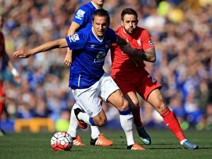 Images Dated 4th October 2015: Intense Rivalry: Jagielka vs. Ings Battle for Ball at Goodison Park