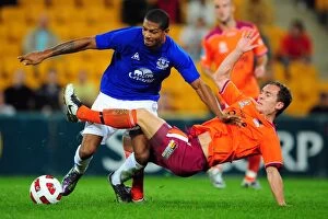 Images Dated 17th July 2010: Intense Rivalry: Jermaine Beckford vs Matt Smith Battle for Ball at Suncorp Stadium - Everton vs