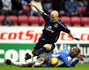Images Dated 20th January 2008: Intense Rivalry: Johnson vs. Bramble Clash in Premier League: Everton vs. Wigan (January 2008)