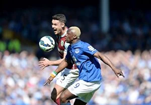 Images Dated 18th April 2015: Intense Rivalry: Kone vs. Shackell's Battle for Supremacy at Goodison Park - Everton vs