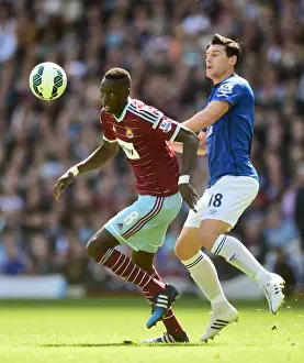 West Ham United V Everton - Upton Park Prints: Intense Rivalry: Kouyate vs. Barry at Upton Park - Everton vs