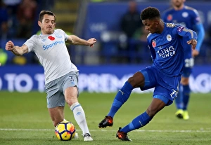 Intense Rivalry: Leighton Baines vs. Demarai Gray - A Battle for Ball Supremacy
