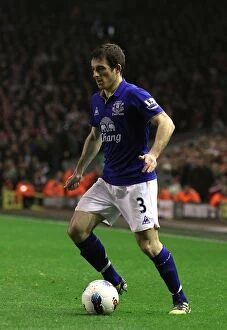 Images Dated 13th March 2012: Intense Rivalry: Leighton Baines vs. Liverpool at Anfield (BPL Clash, 13 March 2012)