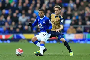 Intense Rivalry: Lennon vs Monreal at Goodison Park - Everton vs Arsenal, Premier League: A Battle for the Ball