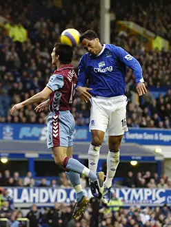 Intense Rivalry: Lescott vs Ridgewell's Battle for Ball Possession - Everton vs Aston Villa (FA Barclays Premiership, Goodison Park, 11/11/06)