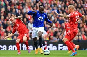 Images Dated 27th September 2014: Intense Rivalry: Lukaku vs. Moreno - Liverpool vs. Everton: A Battle for Supremacy