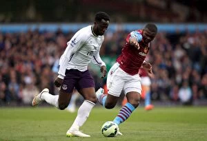Aston Villa v Everton - Villa Park Collection: Intense Rivalry: Lukaku vs. Okore's Battle for Ball Possession - Aston Villa vs